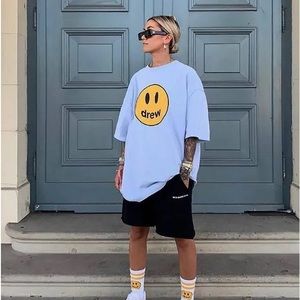 light blue mascot tee